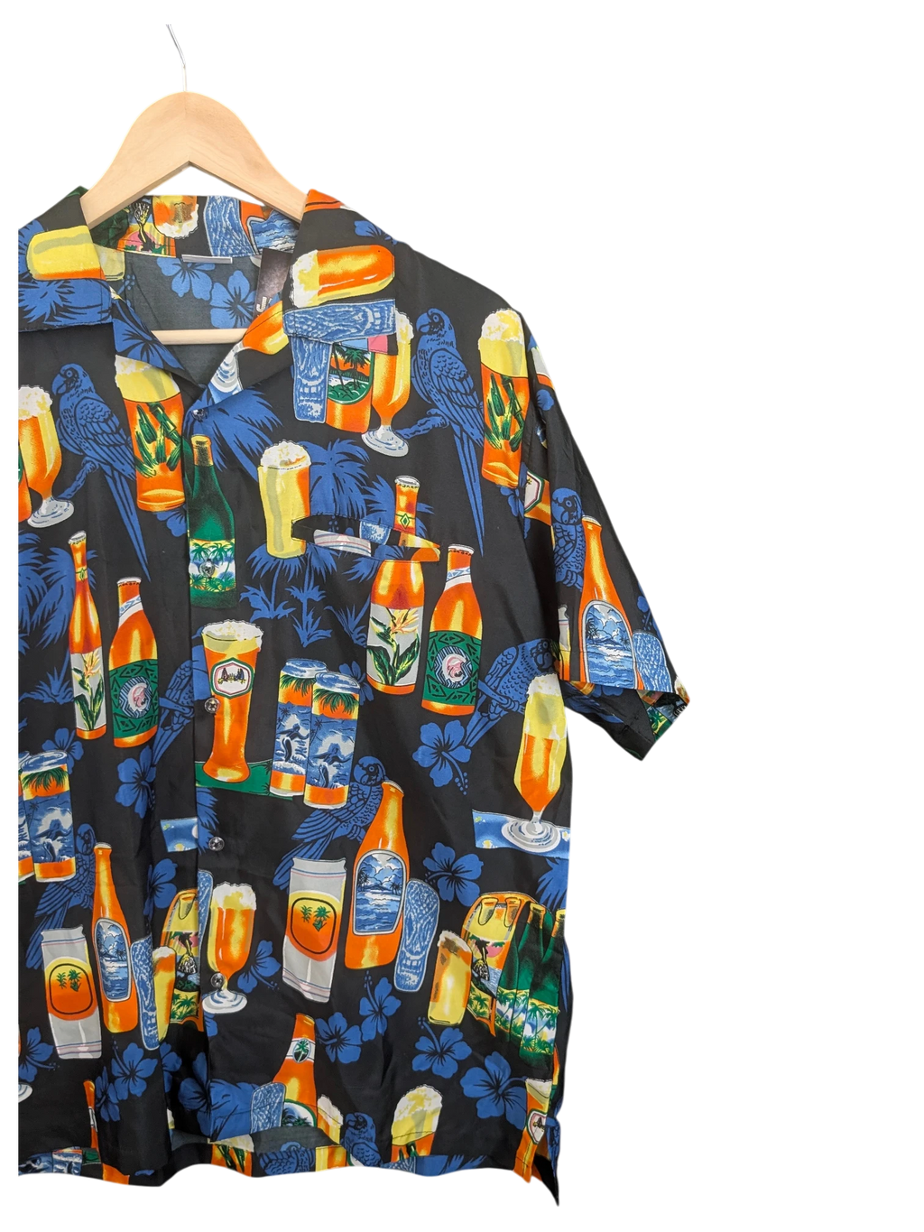 JAKE & IPI King Kahema Hawaiian shirt featuring a black background with a vibrant beer bottle and tropical floral print.