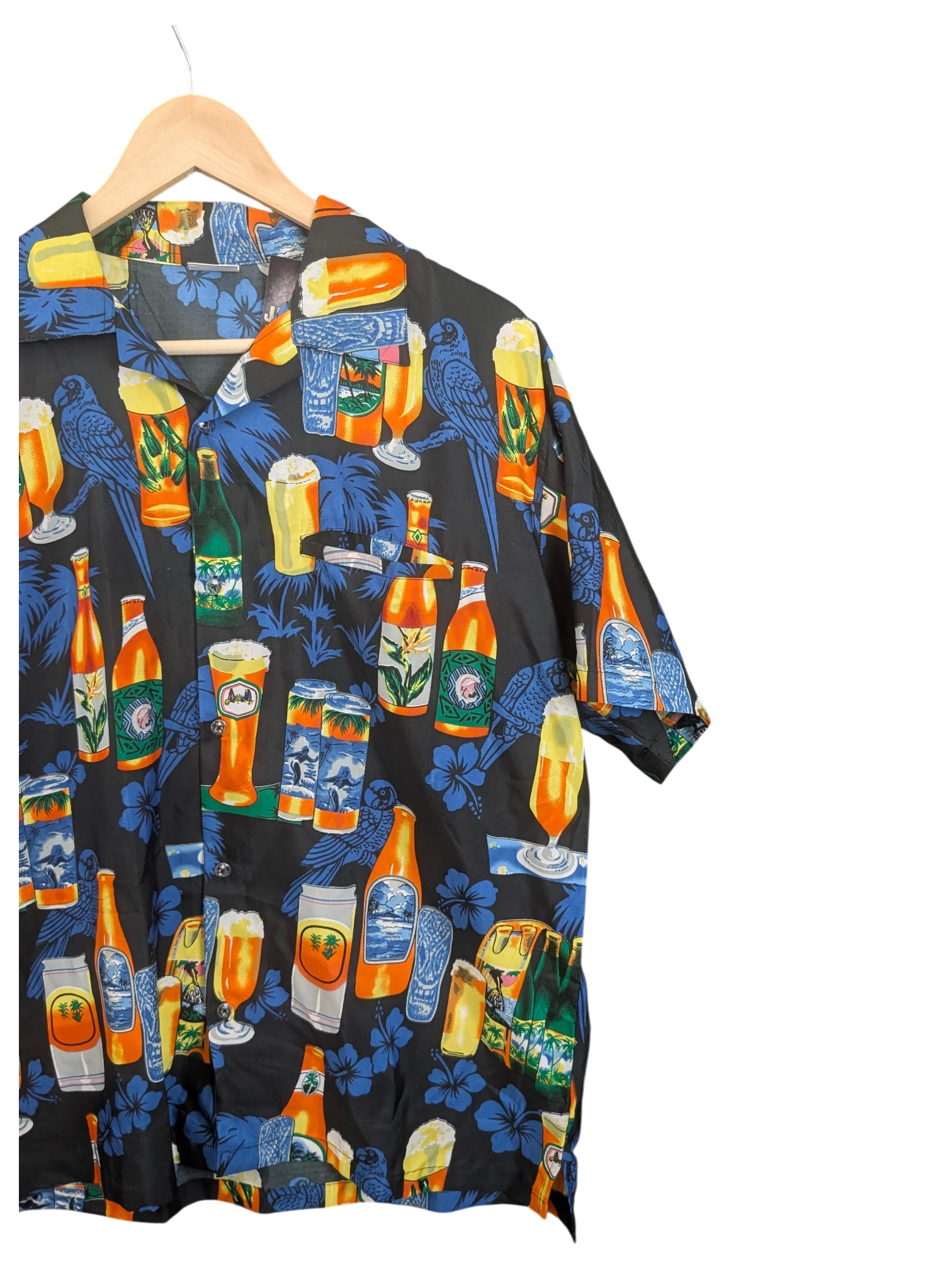 JAKE & IPI King Kahema Hawaiian shirt featuring a black background with a vibrant beer bottle and tropical floral print.