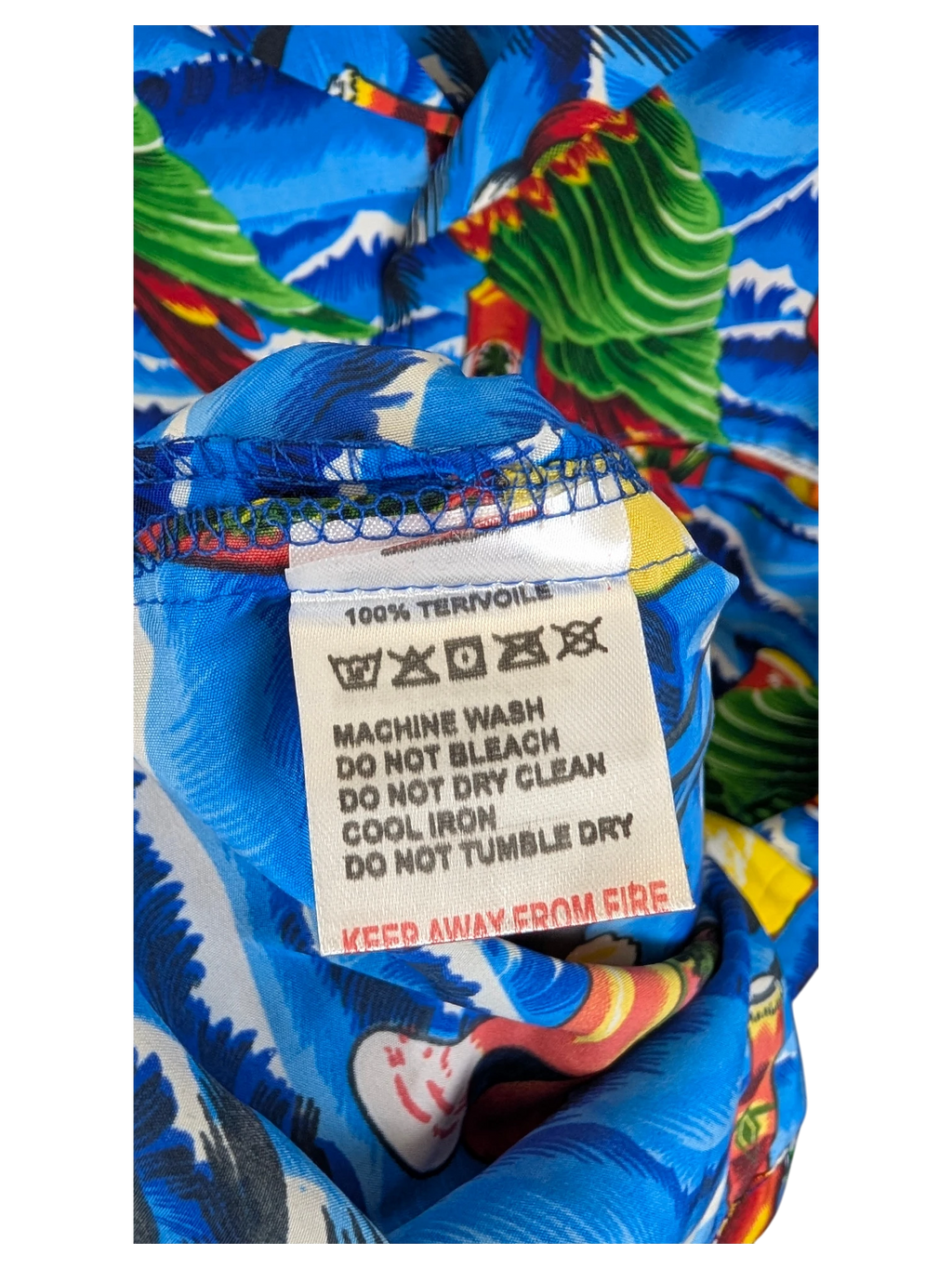 JAKE & IPI V.H.O Hawaiian shirt care label showing 100% tervoile fabric composition and washing instructions