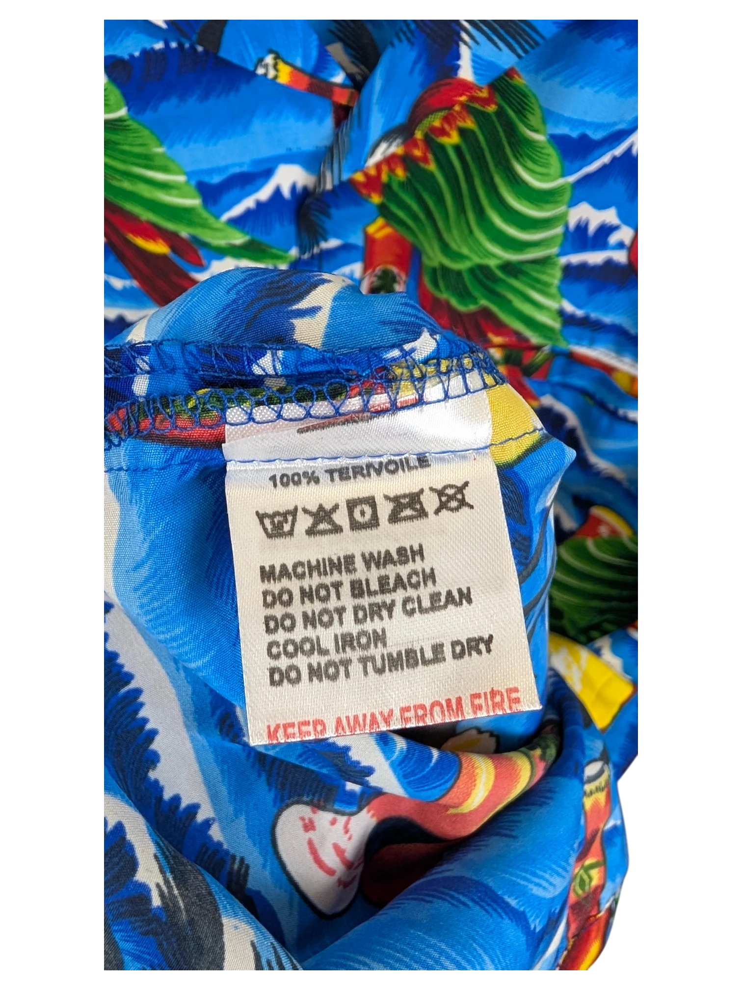 JAKE & IPI V.H.O Hawaiian shirt care label showing 100% tervoile fabric composition and washing instructions