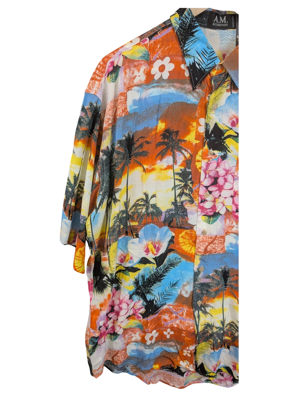 JAKE & IPI A.M. & Company short-sleeve Hawaiian shirt featuring a vibrant tropical sunset, palm tree, and floral print.
