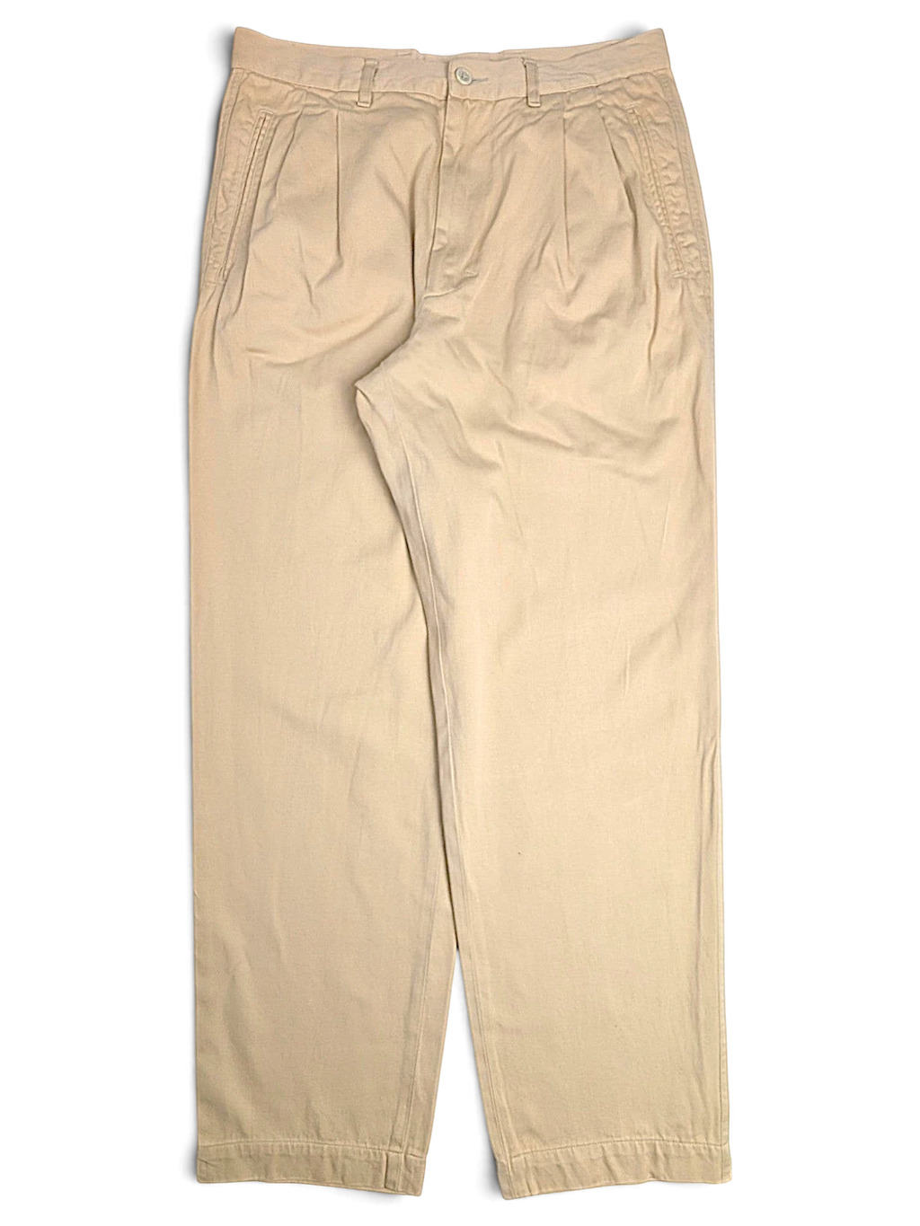 JAKE & IPI Hilton Boutique beige pleated trousers with a tailored waistband and straight leg fit.