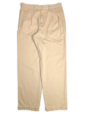 JAKE & IPI Hilton Boutique beige pleated trousers with a tailored waistband and straight leg fit.