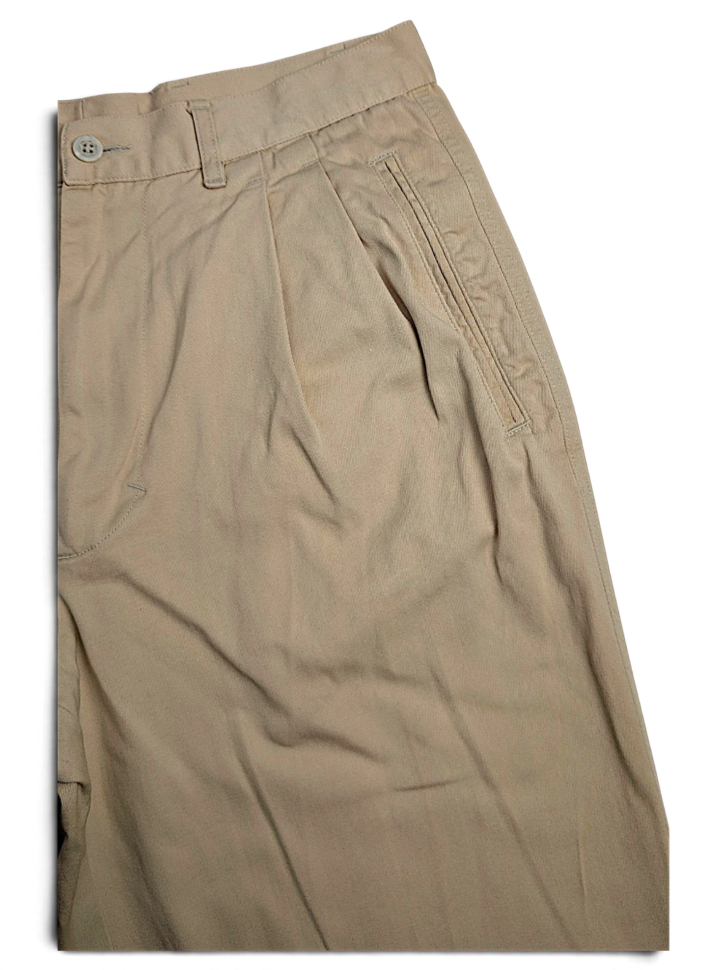 JAKE & IPI Hilton Boutique beige pleated trousers with a tailored waistband and front pocket detail