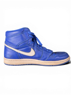 JAKE & IPI Air Jordan 1 Retro High sneakers in hyper royal blue leather with a white swoosh and worn-in finish.