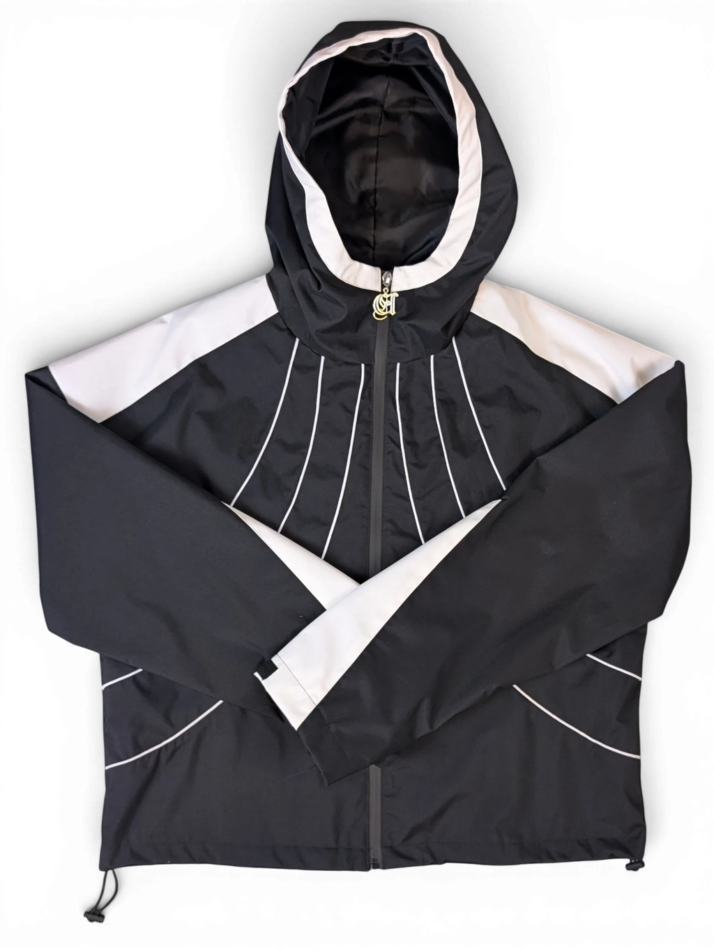 JAKE & IPI IBE Elenyor black and white hooded jacket with decorative white piping and a gold zipper pull