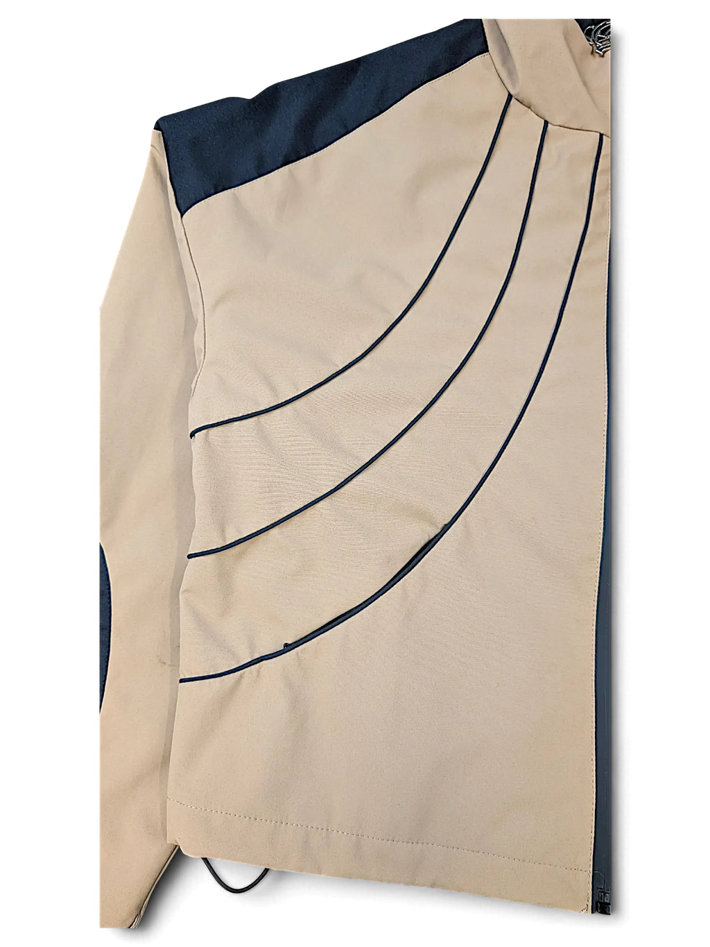 JAKE & IPI IBE Elenyor brown jacket featuring curved dark navy piping details and a sleek modern design.