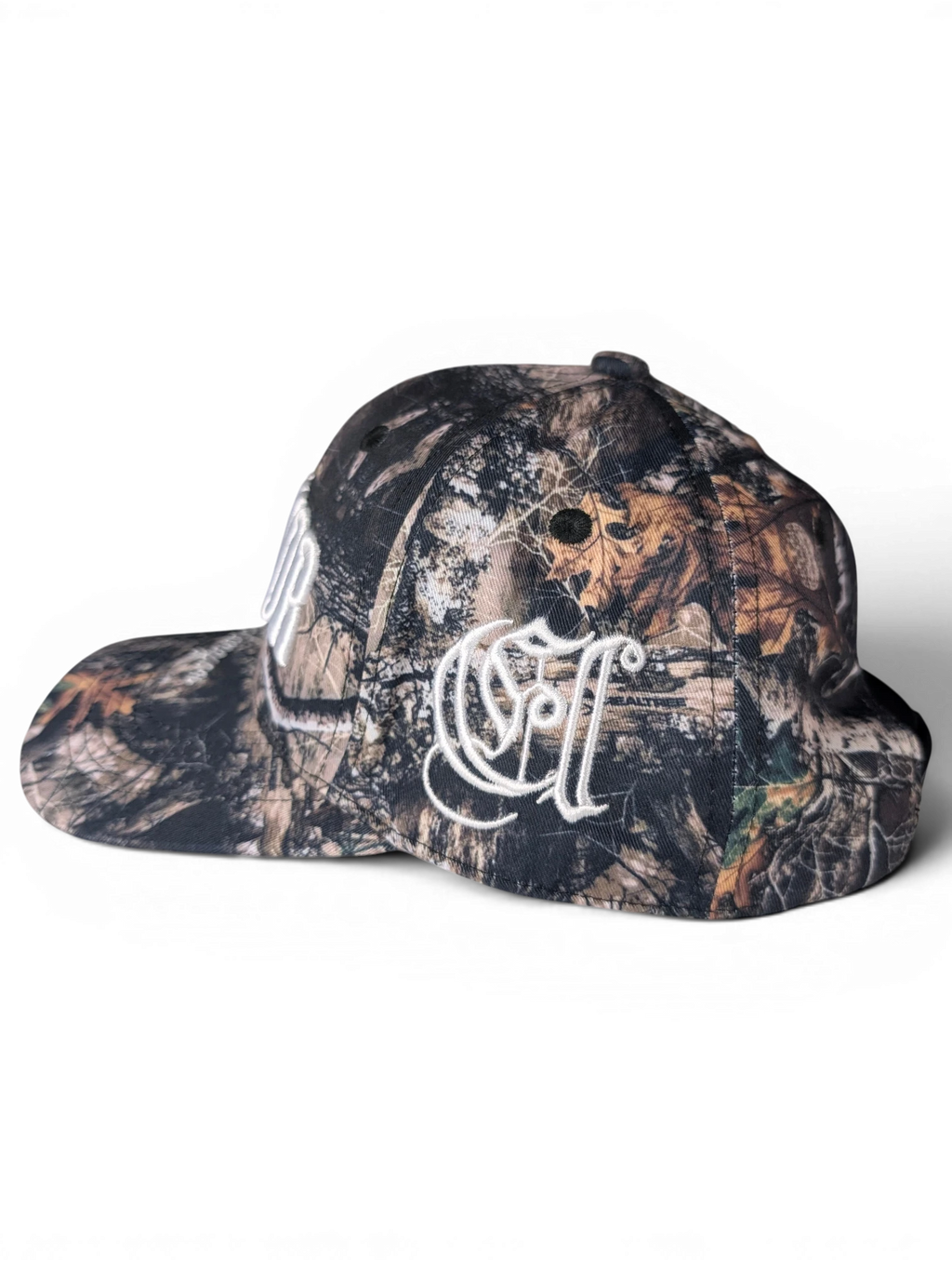 JAKE & IPI IBE Elenyor cap in camouflage print with white embroidered side logo detail