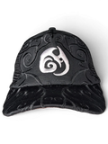 JAKE & IPI IBE Morivelle black cap with white embroidered logo and intricate tonal swirl patterns on the crown and brim.