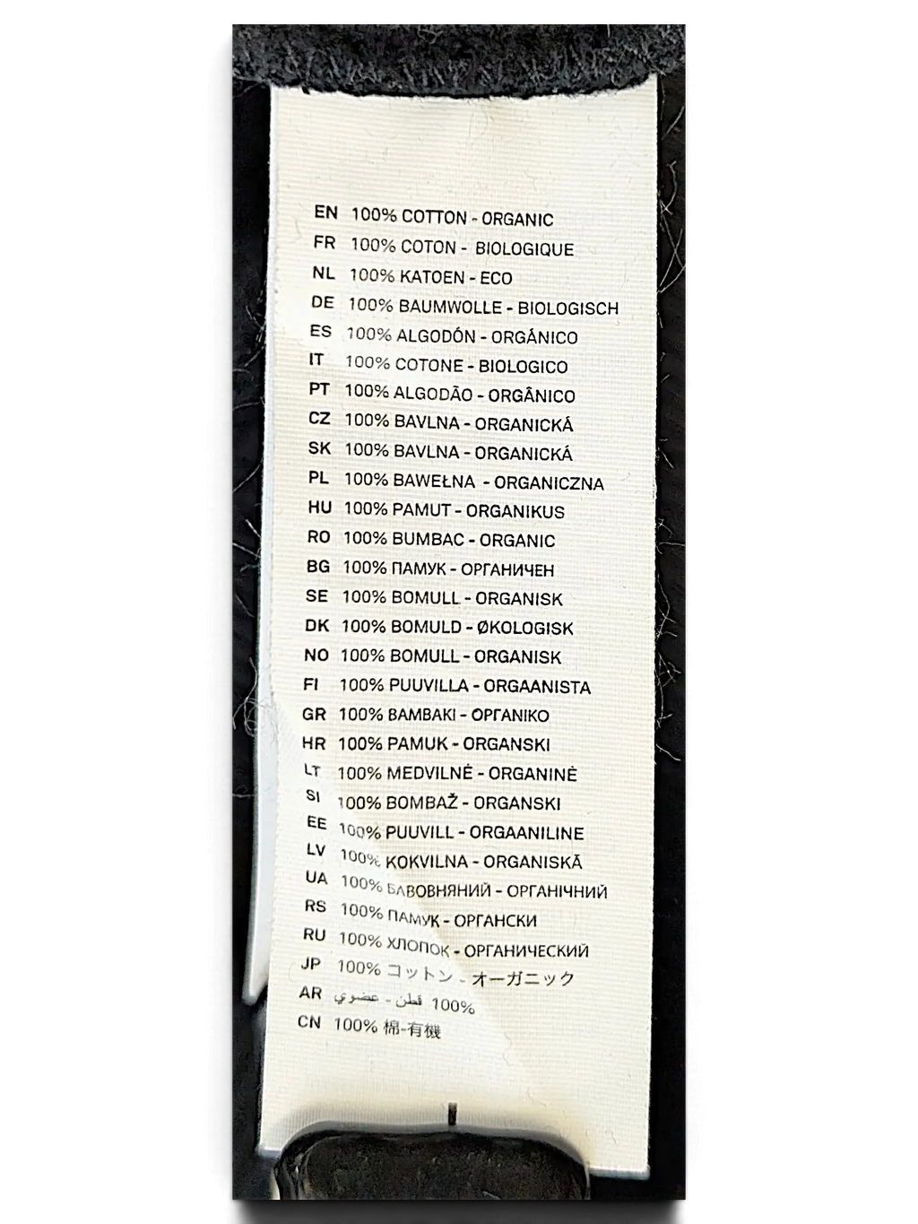 JAKE & IPI IBE Skorpioni crewneck sweatshirt white fabric care label with 100 percent organic cotton text in multiple languages