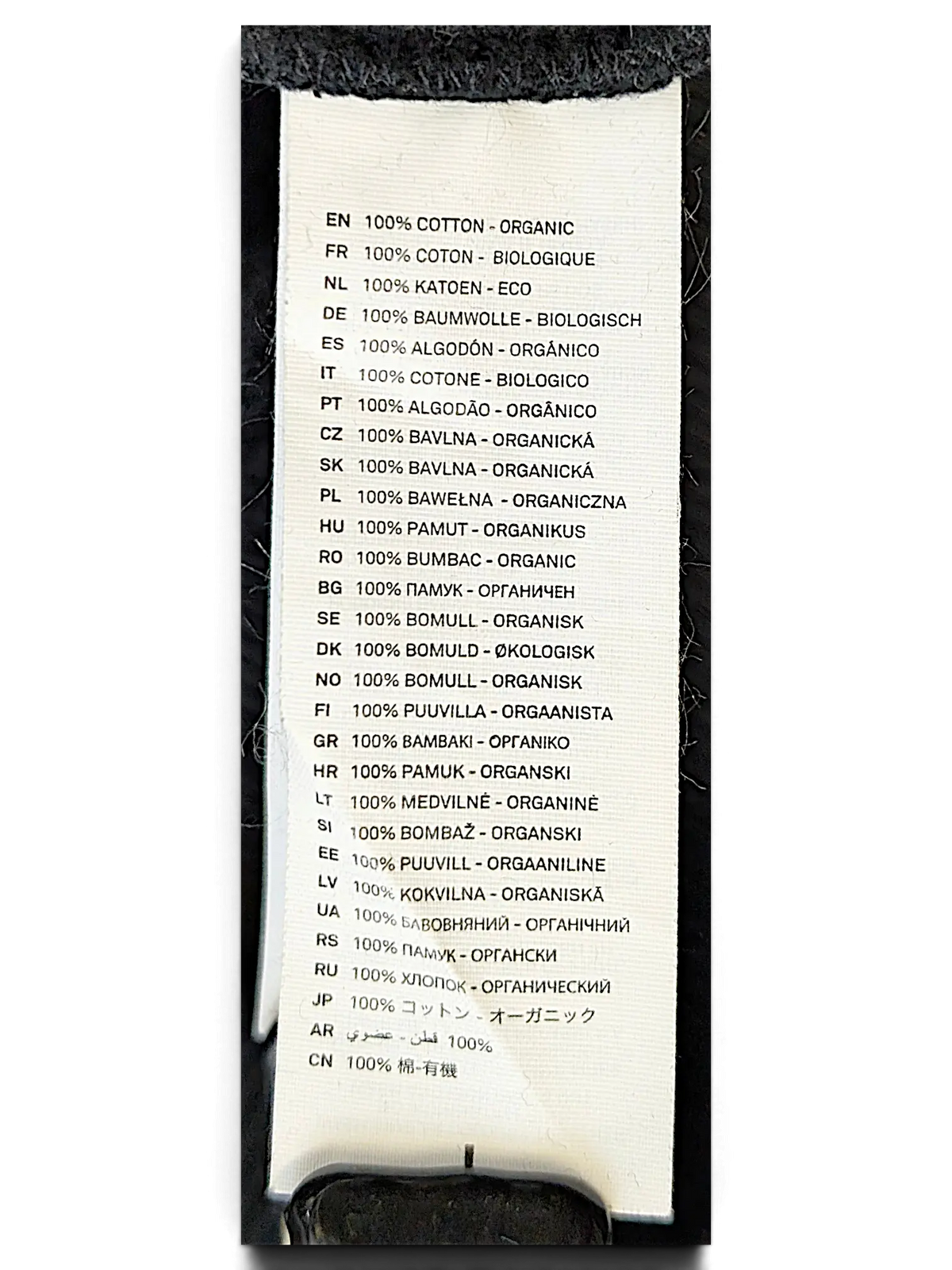 JAKE & IPI IBE Skorpioni crewneck sweatshirt white fabric care label with 100 percent organic cotton text in multiple languages