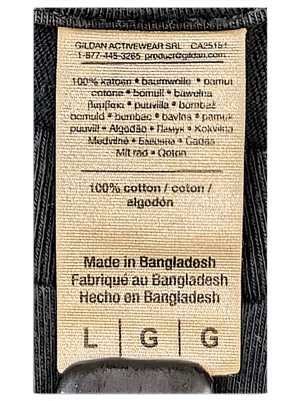 JAKE & IPI IBE Vitunleija T-Shirt beige fabric care label showing 100 percent cotton composition and size large