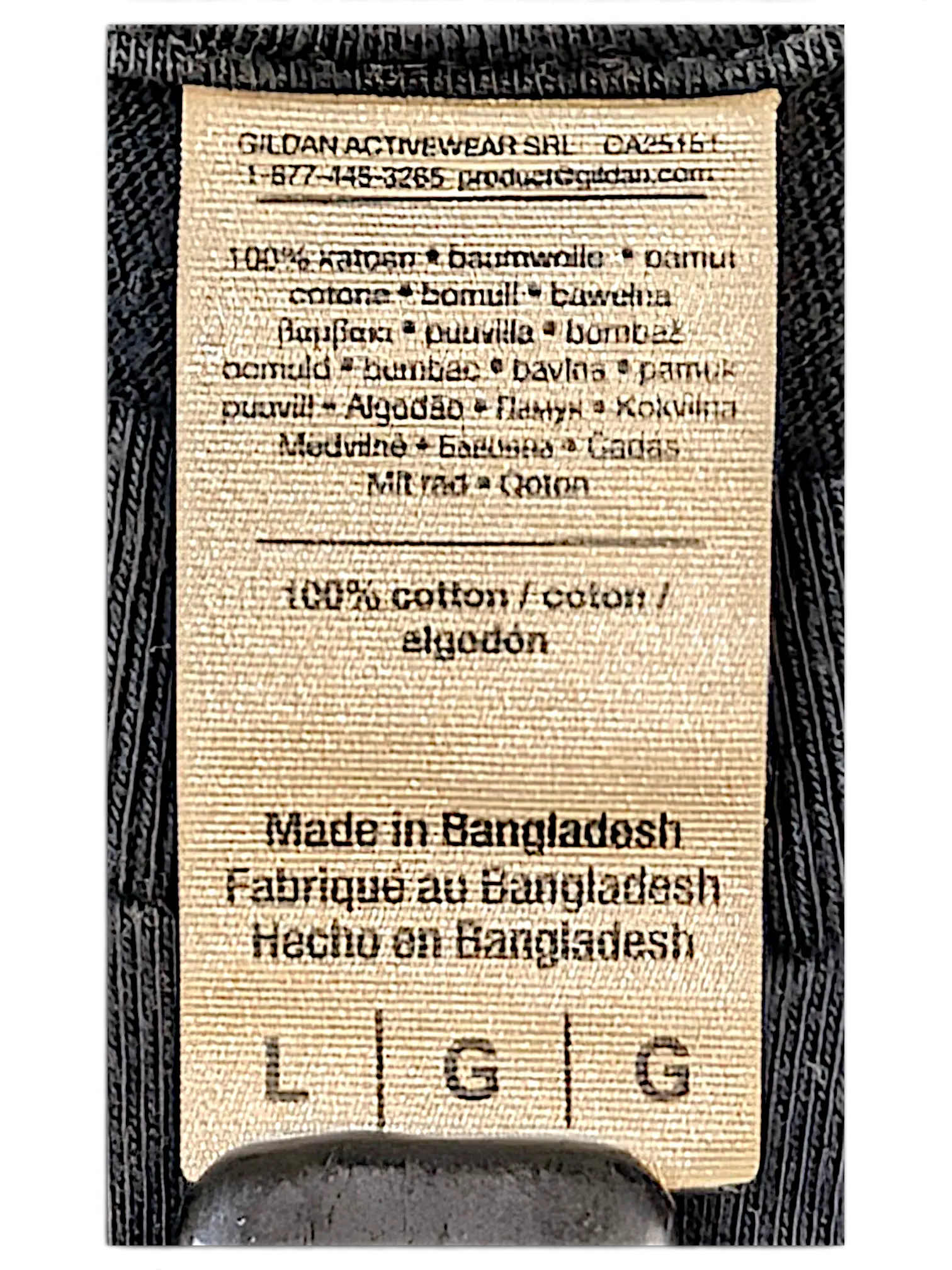 JAKE & IPI IBE Vitunleija T-Shirt beige fabric care label showing 100 percent cotton composition and size large