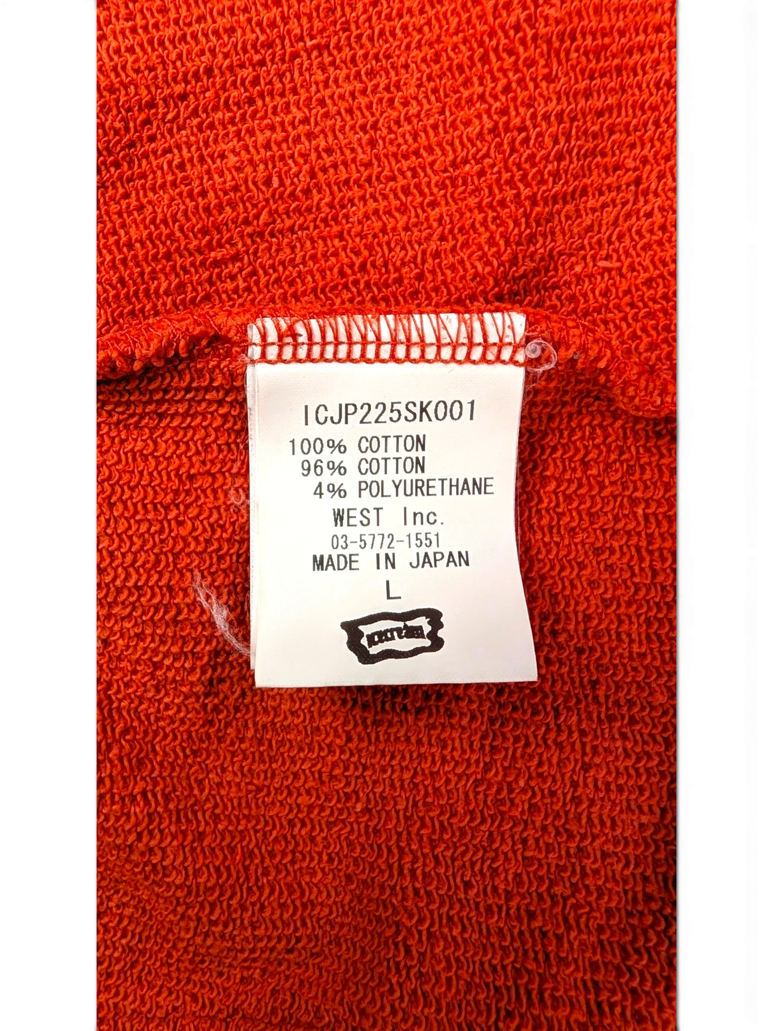 JAKE & IPI Icecream zip hoodie fabric care label showing cotton blend material and made in Japan details