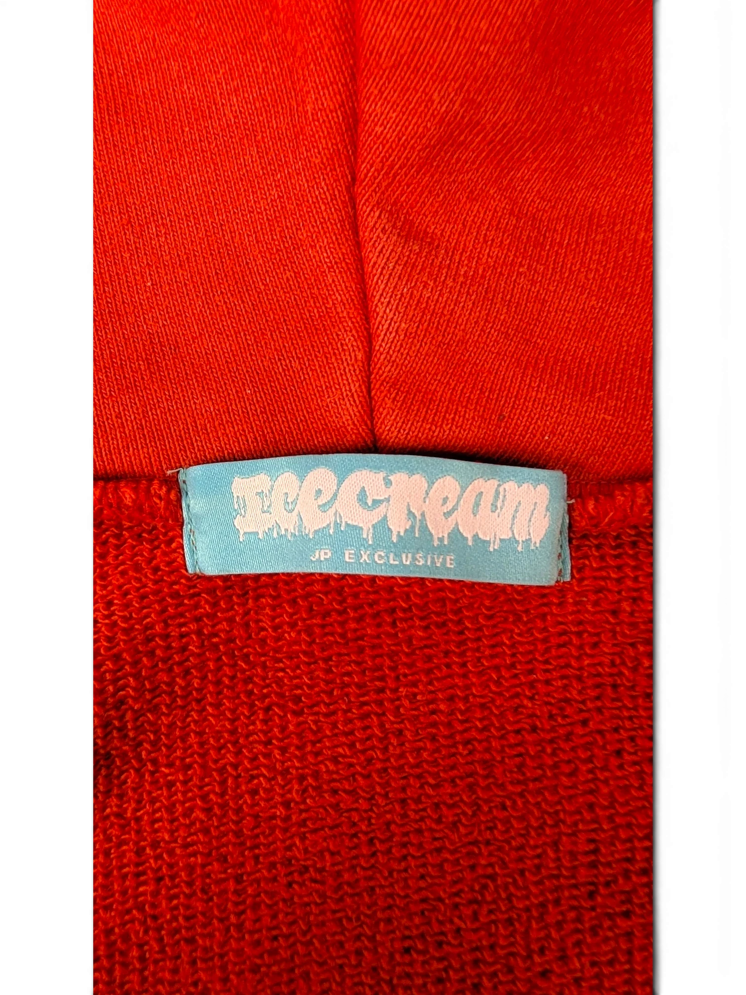 JAKE & IPI Icecream zip hoodie featuring a blue branded neck label on vibrant red fabric