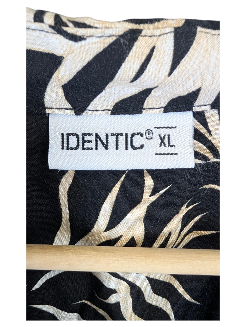 JAKE & IPI Identic Hawaiian shirt featuring a black and beige tropical leaf print with an XL size label