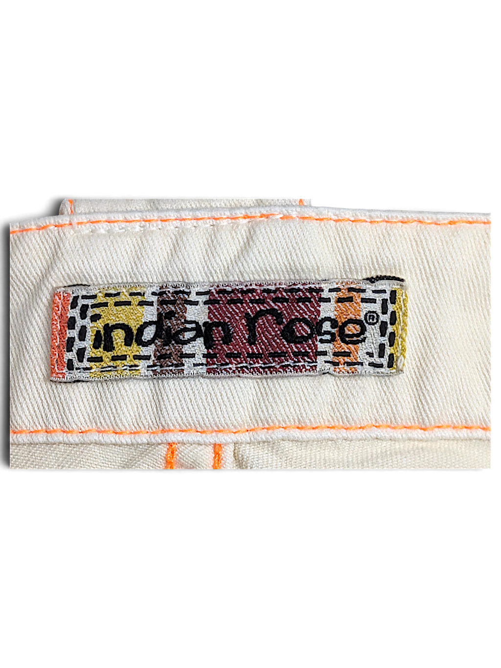 JAKE & IPI Indian Rose white cargo pants brand label with orange contrast stitching on cotton fabric