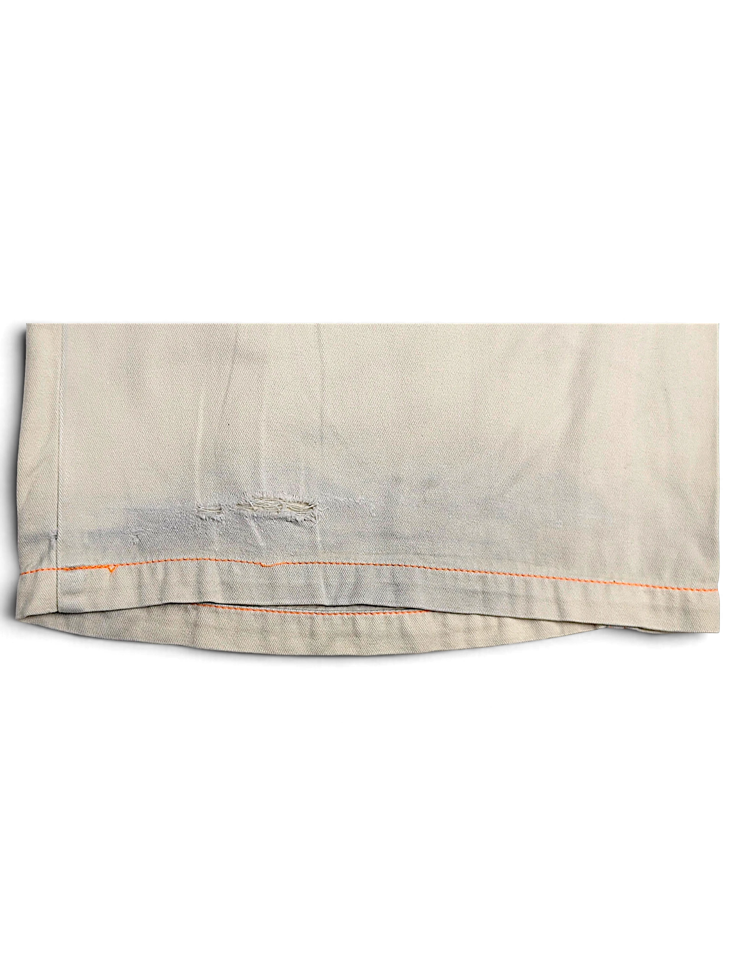 JAKE & IPI Indian Rose white cotton cargo pants hem detail showing orange contrast stitching and fabric wear