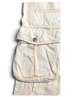 JAKE & IPI Indian Rose white cotton cargo pants featuring orange contrast stitching and a utility pocket detail.