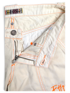 JAKE & IPI Indian Rose white cotton cargo pants with vibrant orange contrast stitching and branded metal button detail.