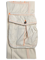JAKE & IPI Indian Rose white cotton cargo pants with vibrant orange contrast stitching and utility pocket detail