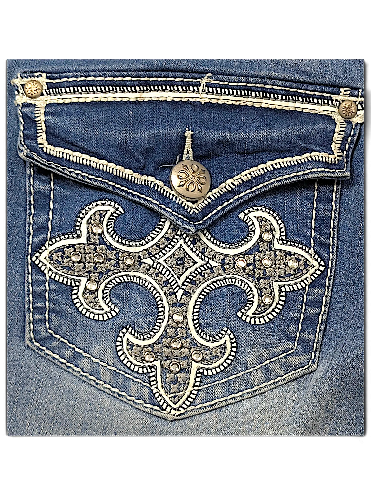 JAKE & IPI indigo denim jeans back pocket with white contrast stitching and ornate rhinestone cross embroidery