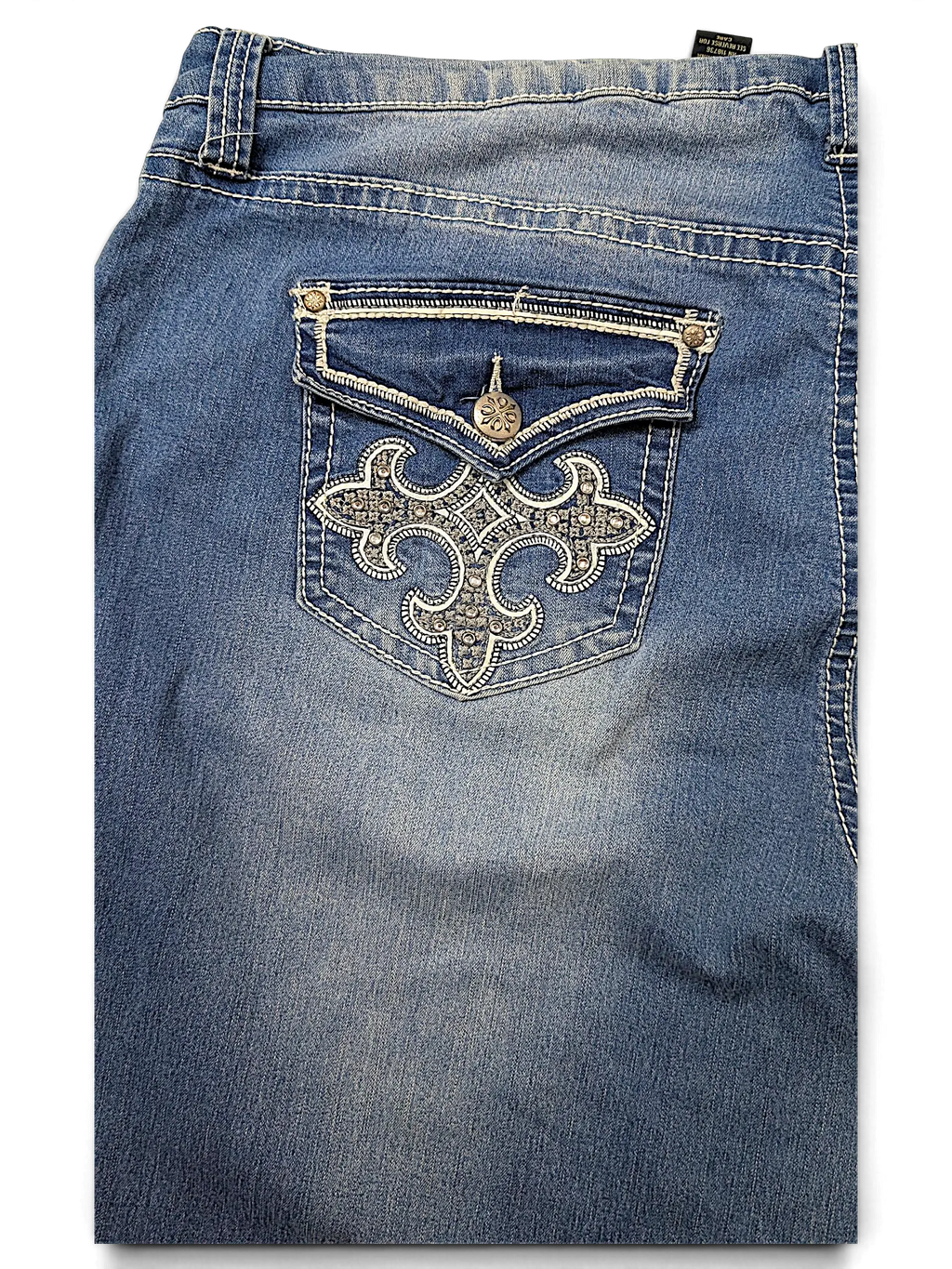 JAKE & IPI indigo Y2K jeans featuring a back pocket with intricate white embroidery, silver studs, and a button flap.