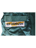 JAKE & IPI Jeff Hamilton varsity jacket interior featuring green quilted lining and leather pocket detail