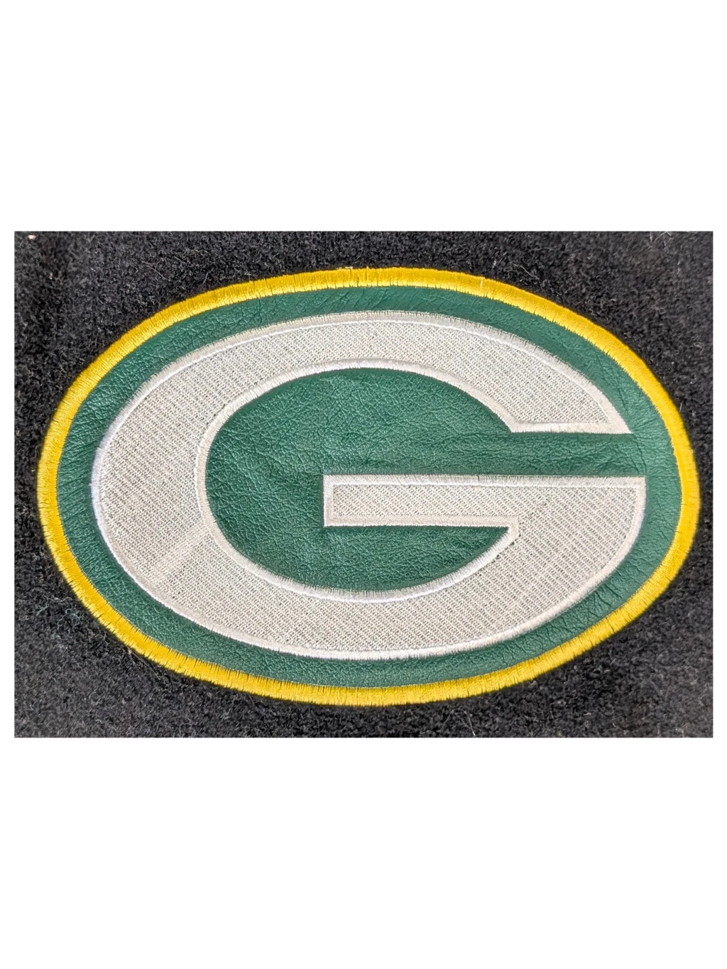 JAKE & IPI Jeff Hamilton varsity jacket featuring a green, yellow, and white leather Green Bay Packers G logo patch.