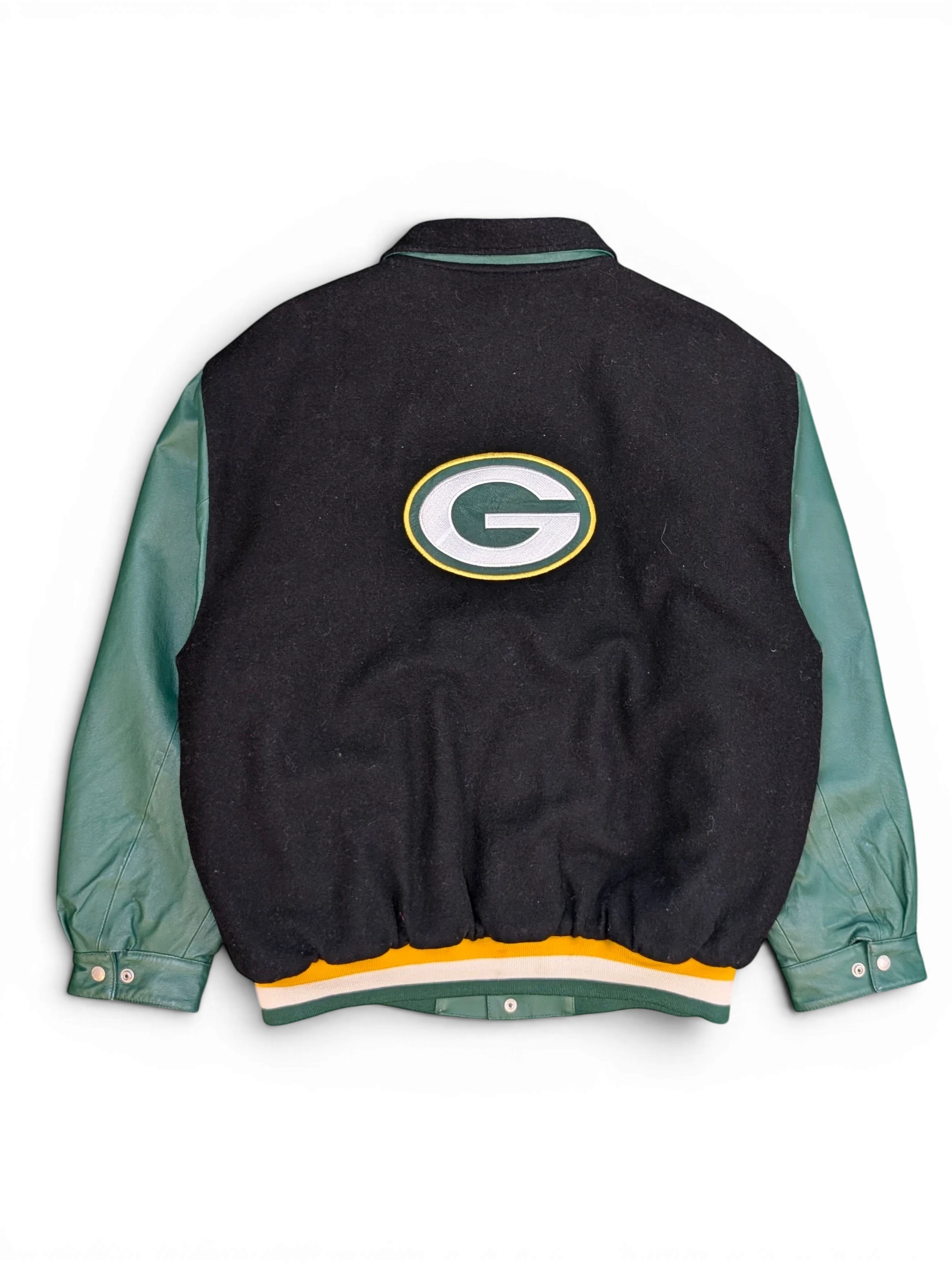 JAKE & IPI Jeff Hamilton Green Bay Packers varsity jacket with black wool body, green leather sleeves, and G logo.