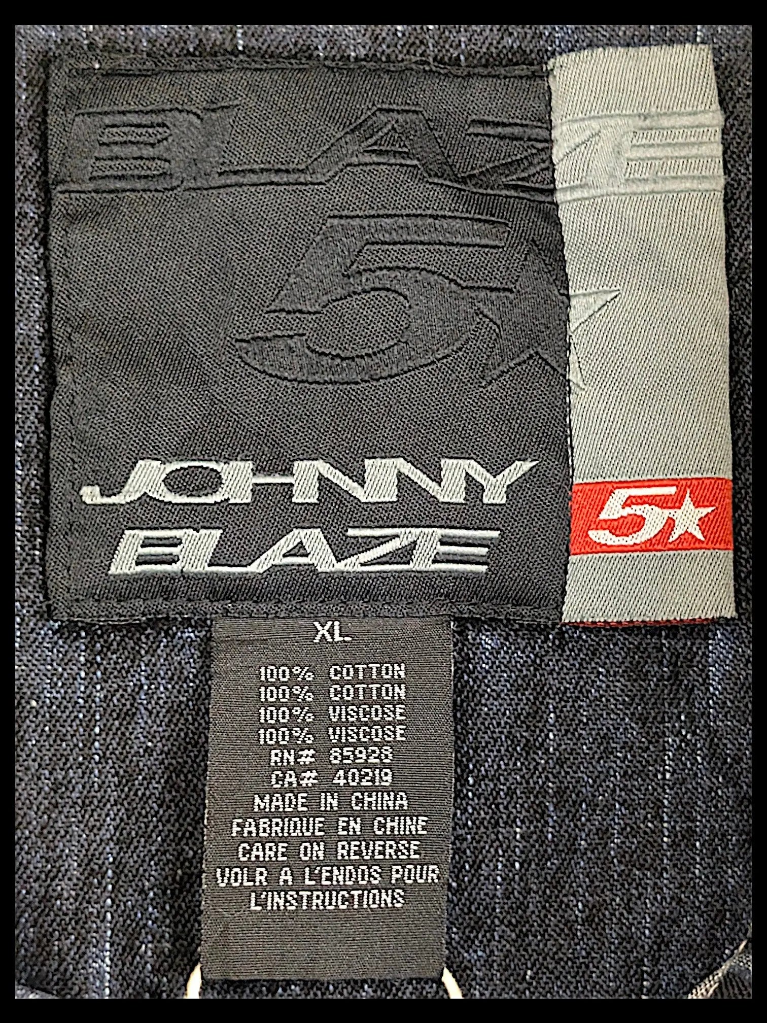JAKE & IPI Johnny Blaze denim jacket interior label showing size XL and 100 percent cotton material composition