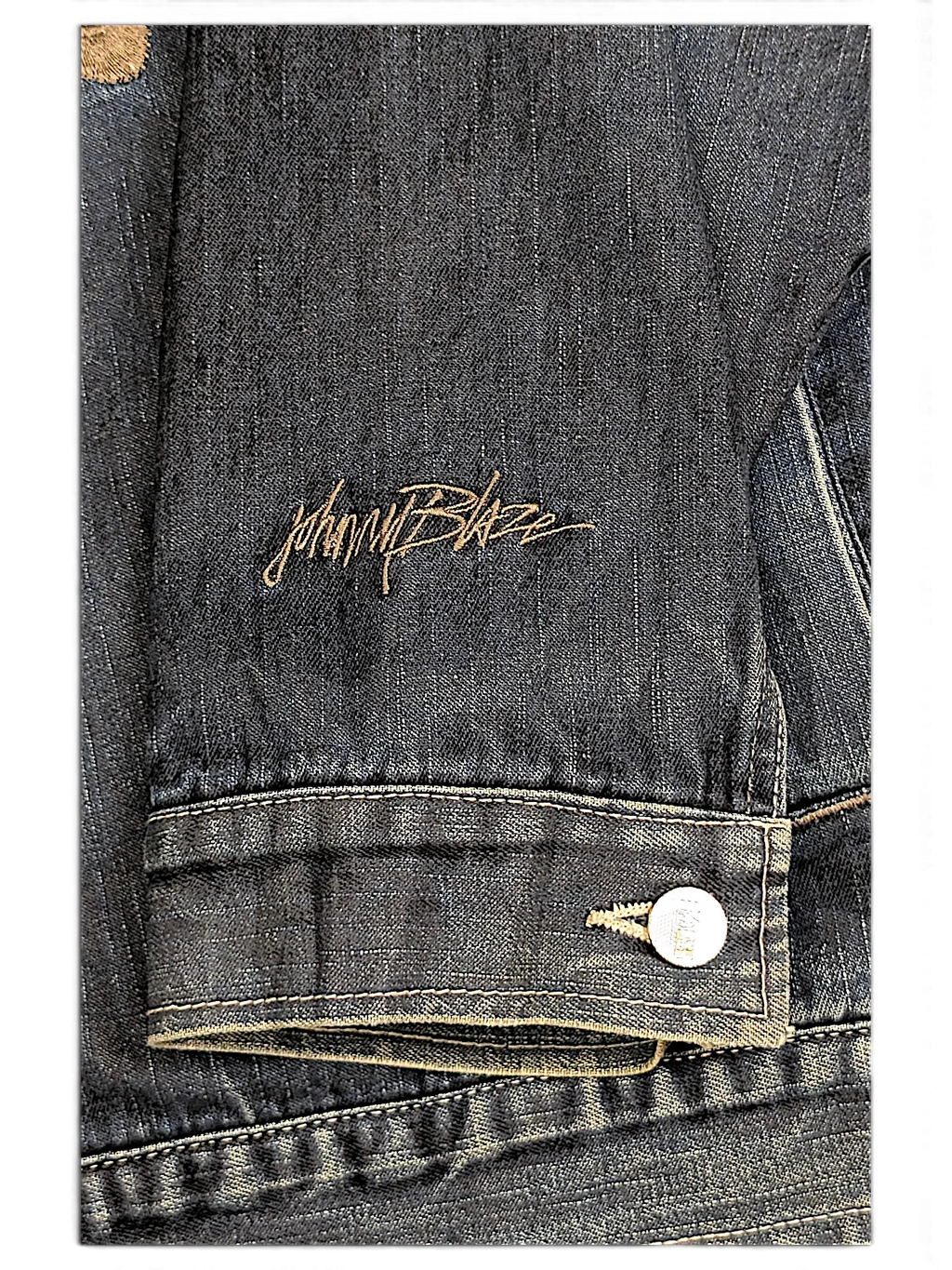JAKE & IPI Johnny Blaze dark wash denim jacket sleeve with embroidered logo detail and metallic button cuff
