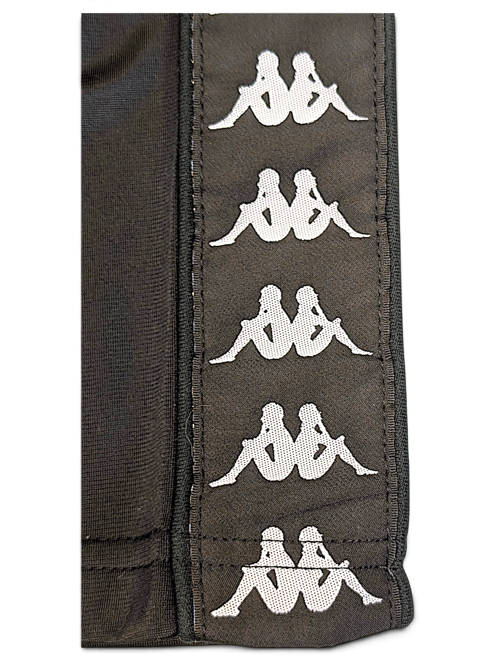 JAKE & IPI pre-owned Kappa black track pants featuring white repeating Omini logo tape detail along the side leg