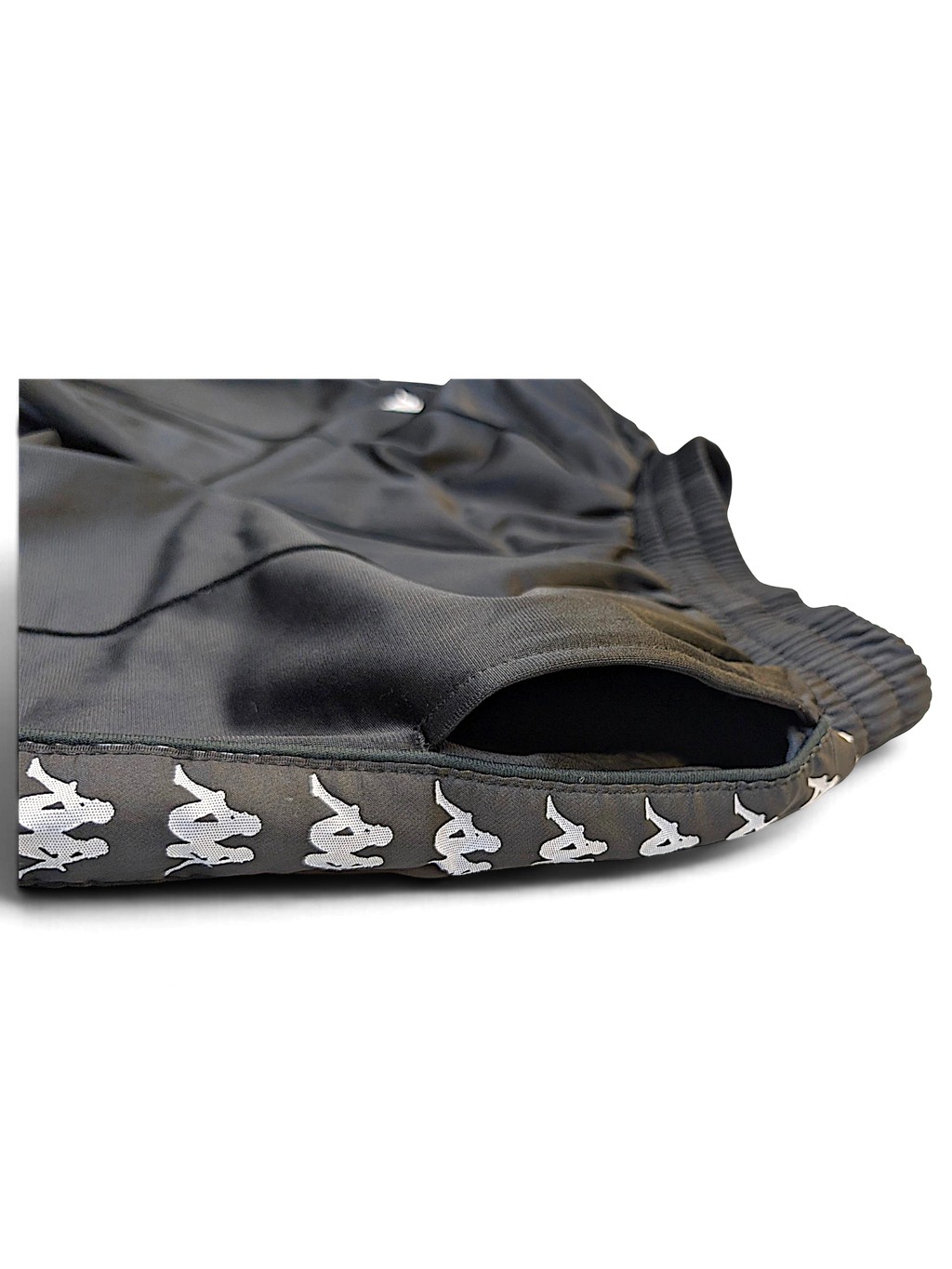 JAKE & IPI pre-owned black Kappa track pants with white Omini logo tape detail along the side pocket