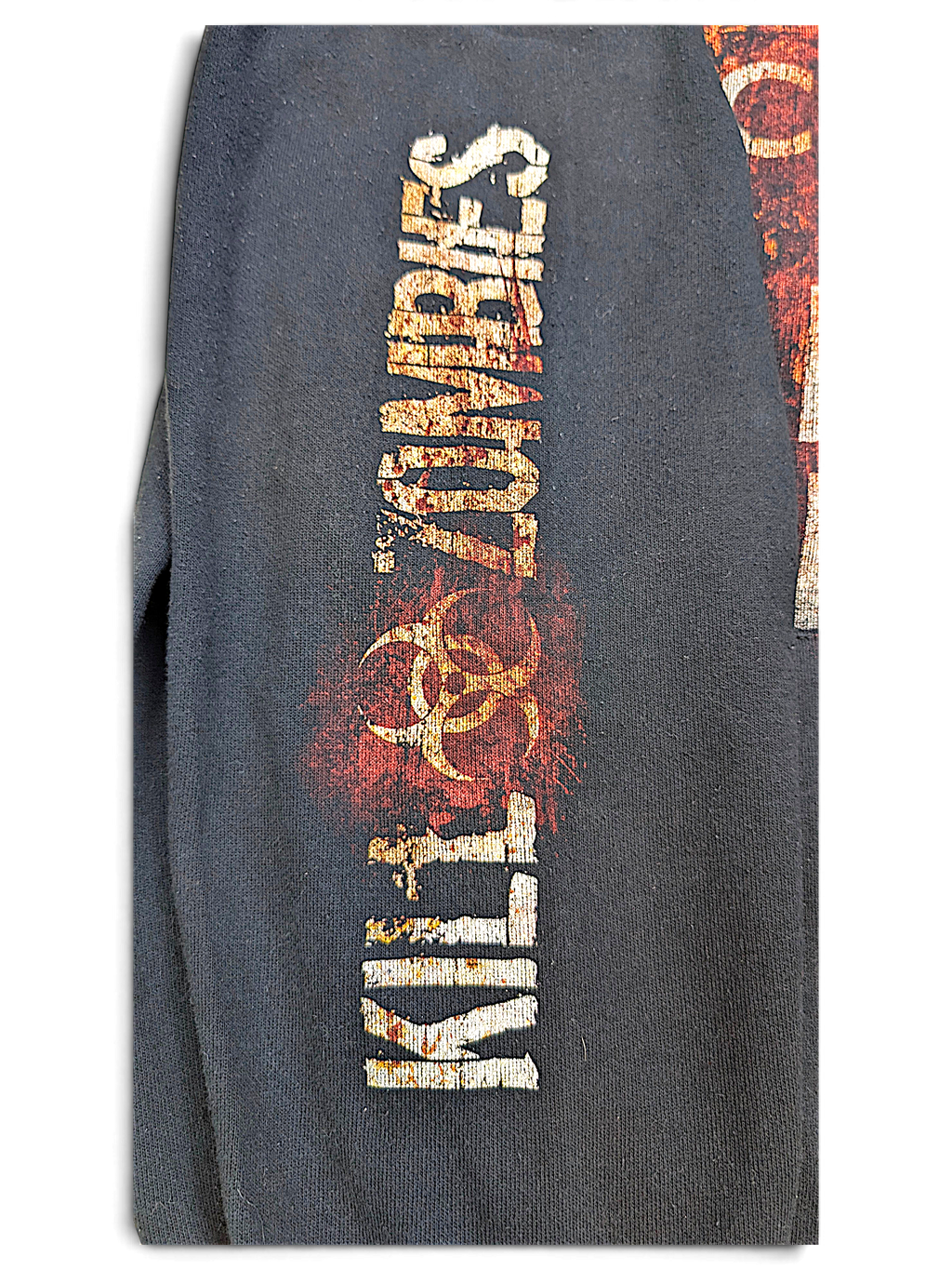 JAKE & IPI black hoodie sleeve featuring distressed Kill Zombies text and a biohazard symbol graphic