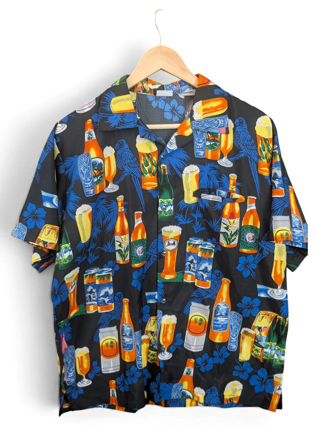 JAKE & IPI King Kahema Hawaiian shirt featuring a black background with a vibrant beer bottle and glass print.