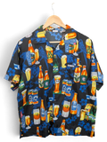 JAKE & IPI King Kahema Hawaiian shirt featuring a black background with a vibrant beer bottle and glass print.
