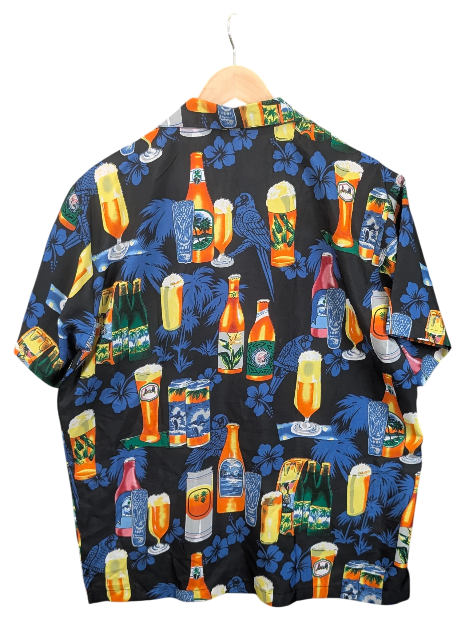 JAKE & IPI King Kahema Hawaiian shirt featuring a black background with a vibrant beer bottle and glass print