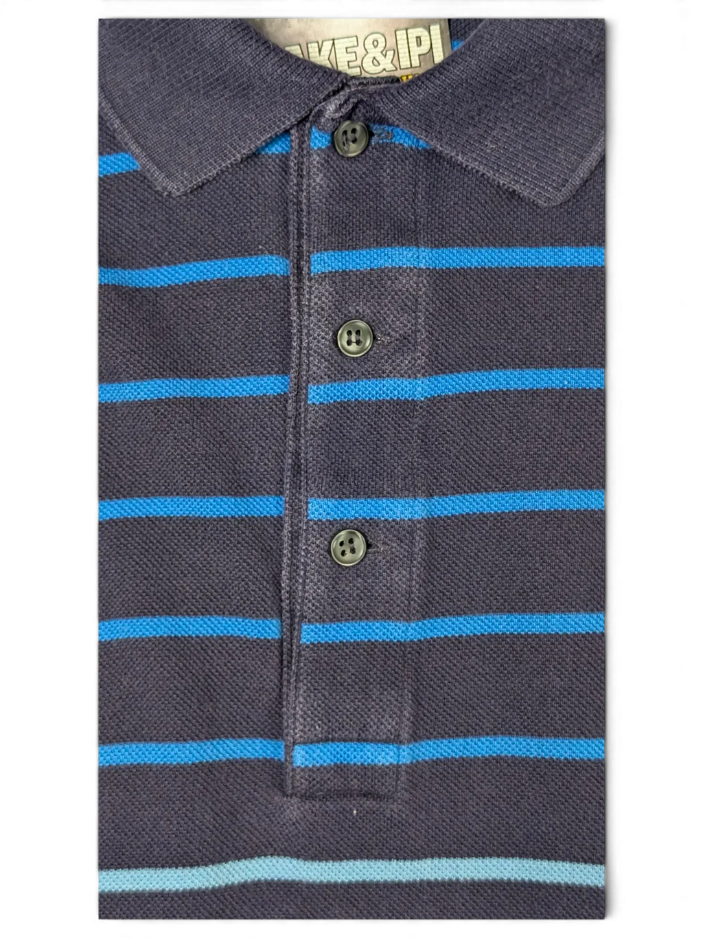 JAKE & IPI pre-owned Lacoste navy polo shirt featuring horizontal blue, grey, and beige stripes and a button placket.
