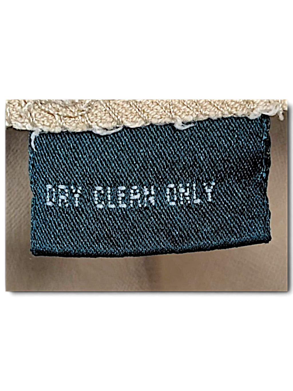 JAKE & IPI Lauren Ralph Lauren beige trousers care label with white text reading Dry Clean Only