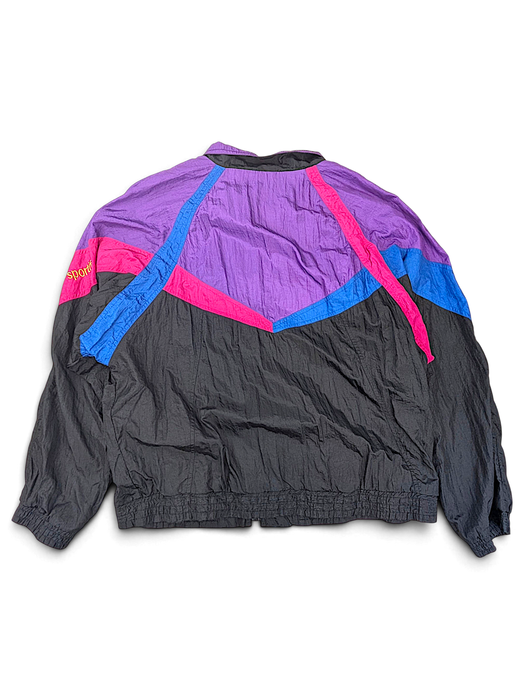 Le Coq Sportif Black and Purple Colourblock Windbreaker; Back view of the geometric colourblocking.