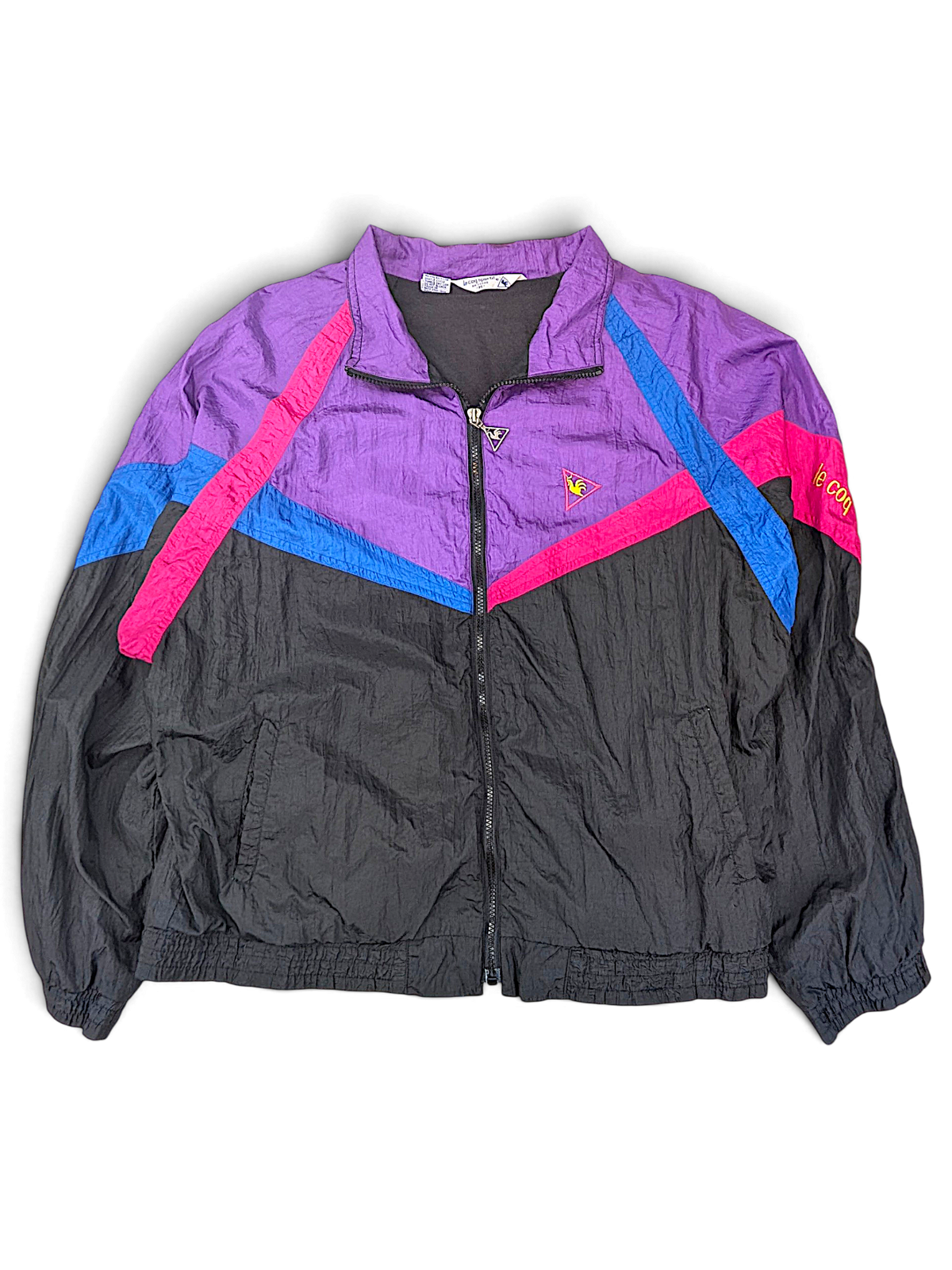 Le Coq Sportif Black and Purple Colourblock Windbreaker; Front view of the black, purple, blue and pink windbreaker.