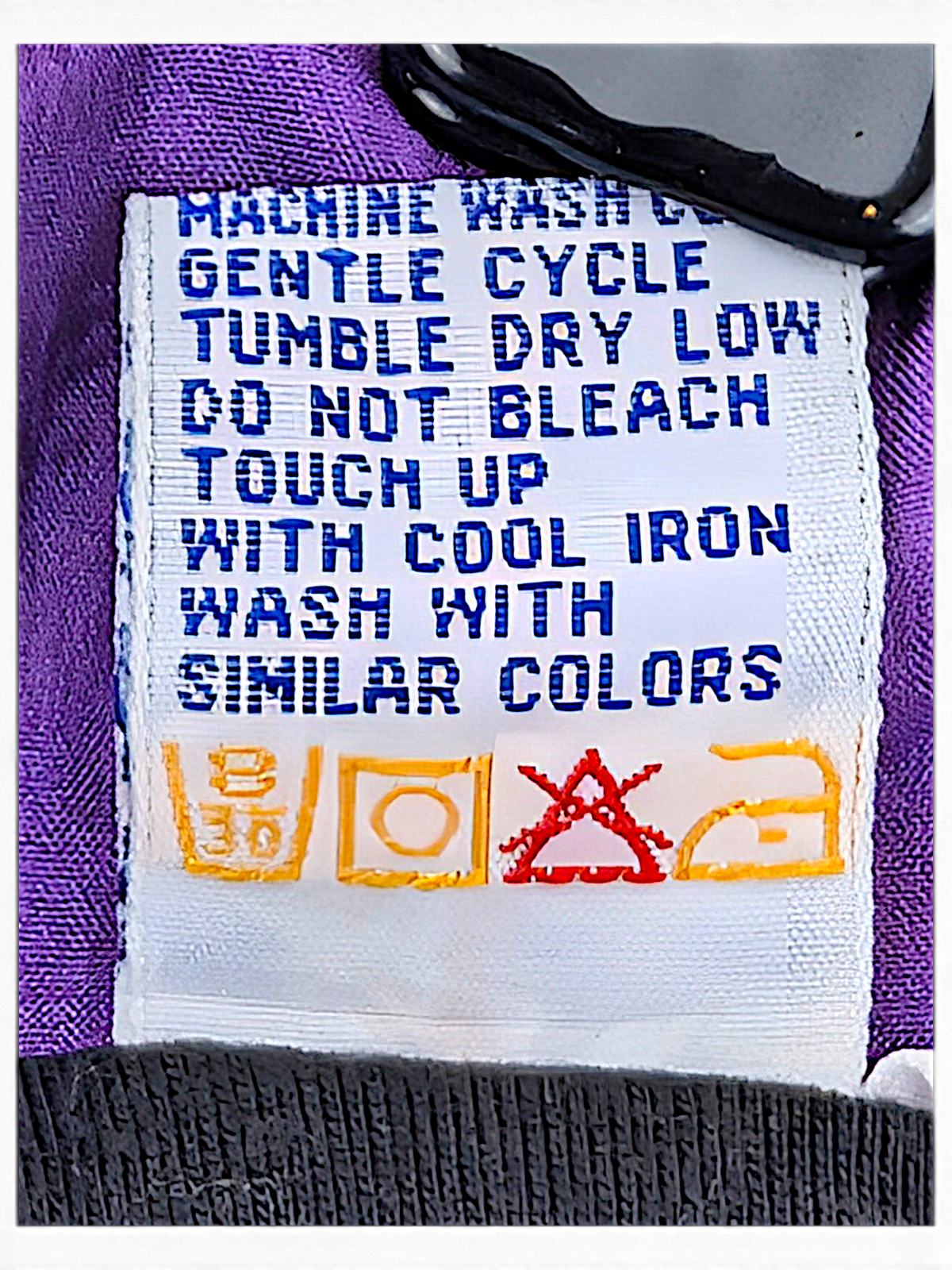 Le Coq Sportif Black and Purple Colourblock Windbreaker; Gentle wash and low tumble dry care instructions.