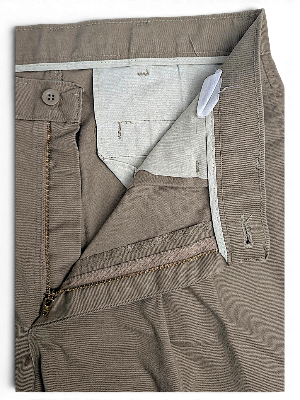 JAKE & IPI Lee Performance Khakis beige pleated trousers showing the zipper fly, button closure, and interior lining.