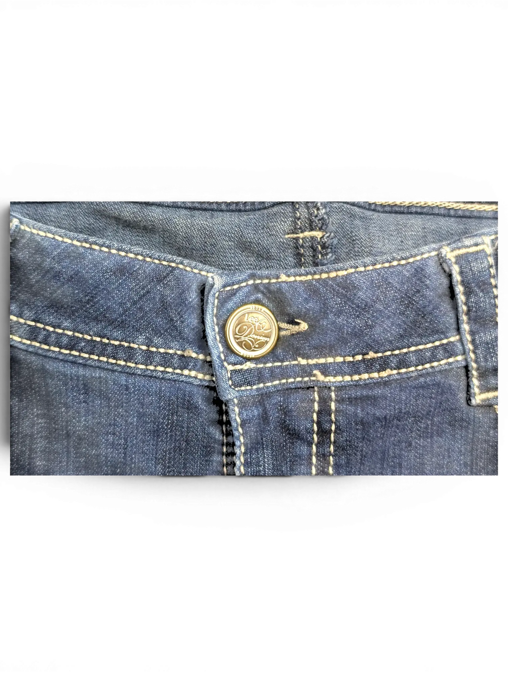 JAKE & IPI Lee Slender Secret dark wash denim jeans featuring a branded metal button and contrast stitching