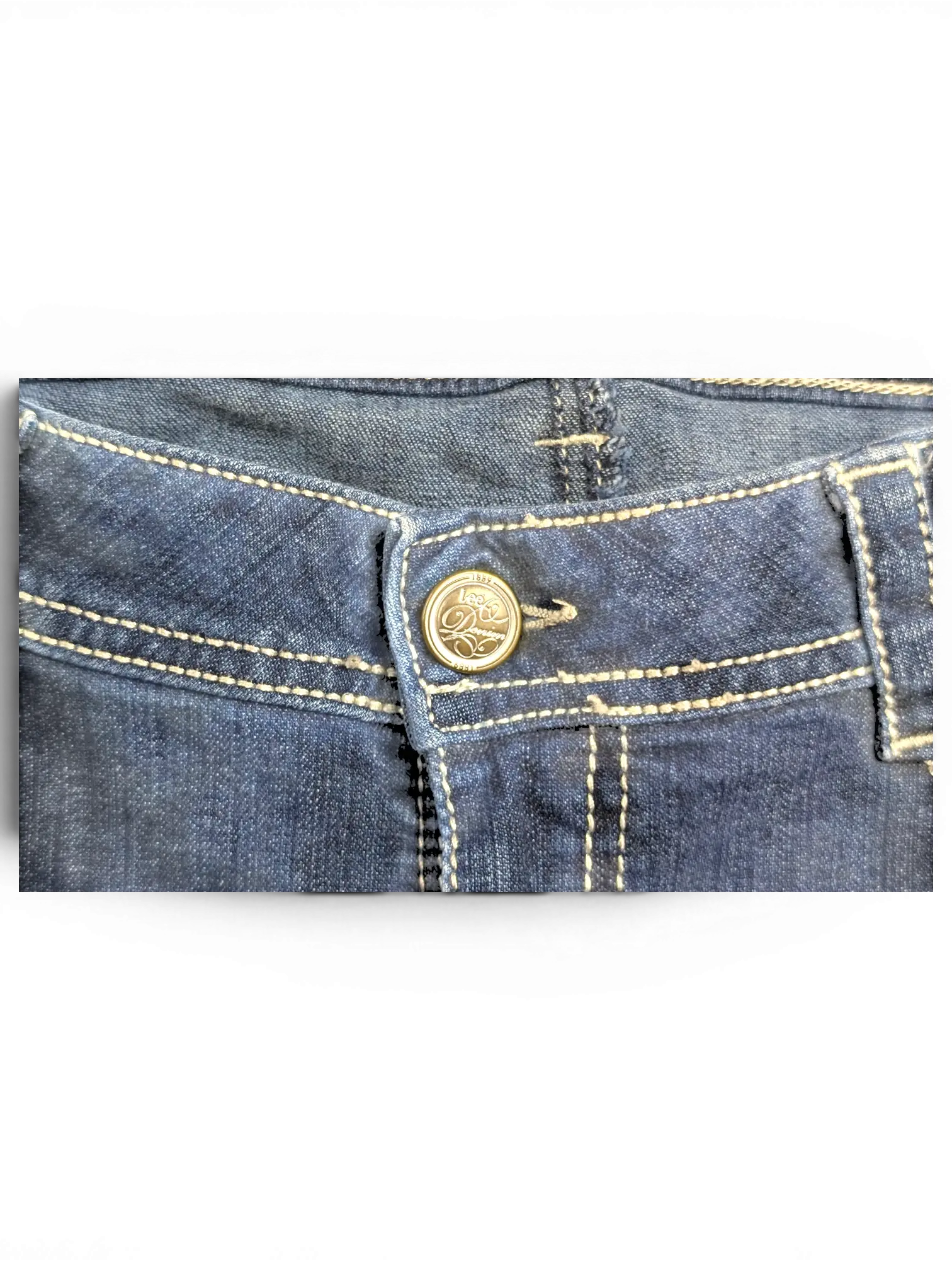JAKE & IPI Lee Slender Secret dark wash denim jeans featuring a branded metal button and contrast stitching