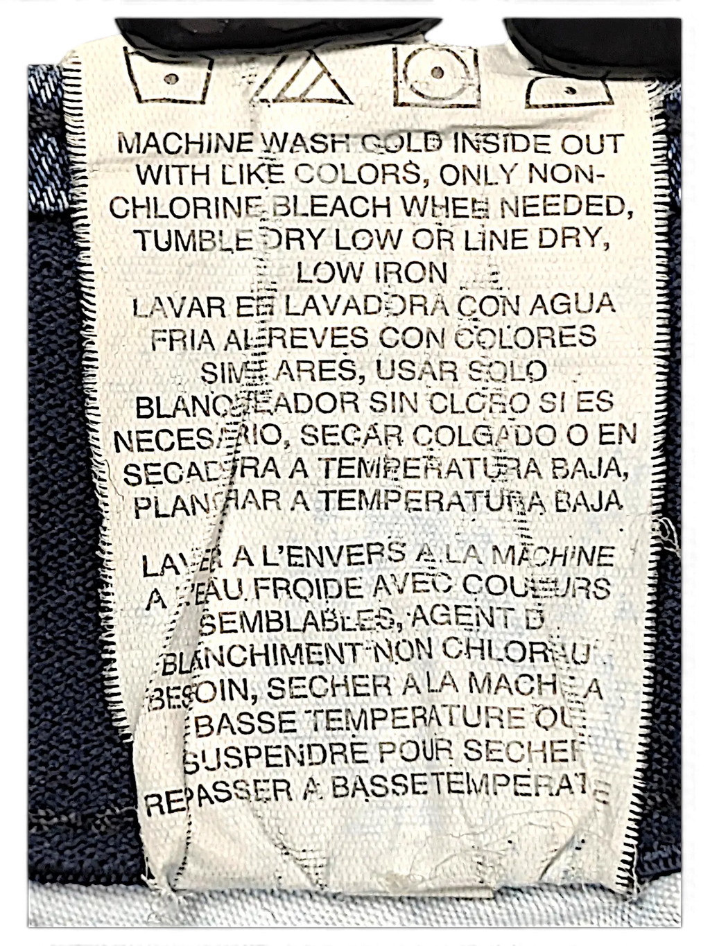 JAKE & IPI Lee Plus regular fit jeans care label with washing instructions in English, Spanish, and French.