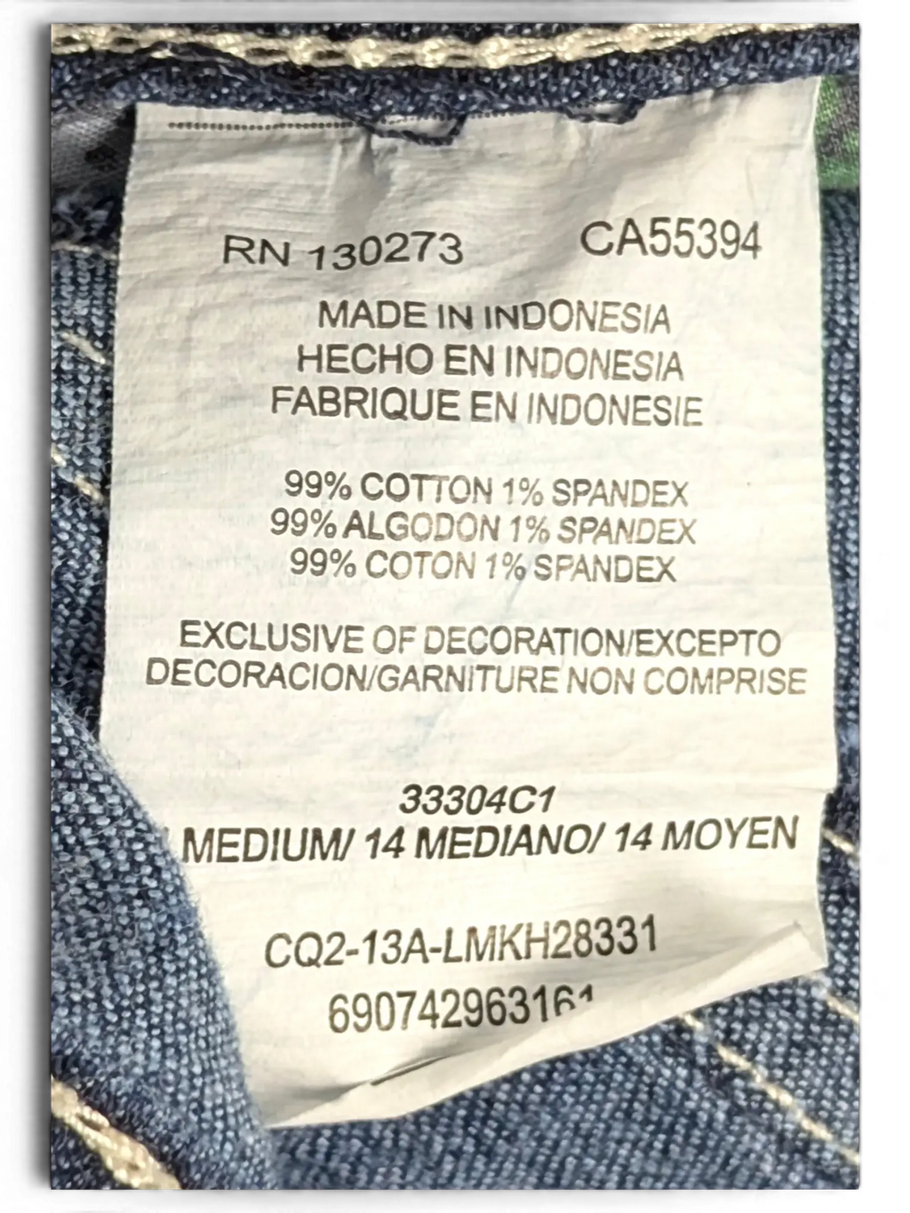 JAKE & IPI Lee Slender Secret size 14 denim jeans care label showing 99 percent cotton and 1 percent spandex blend