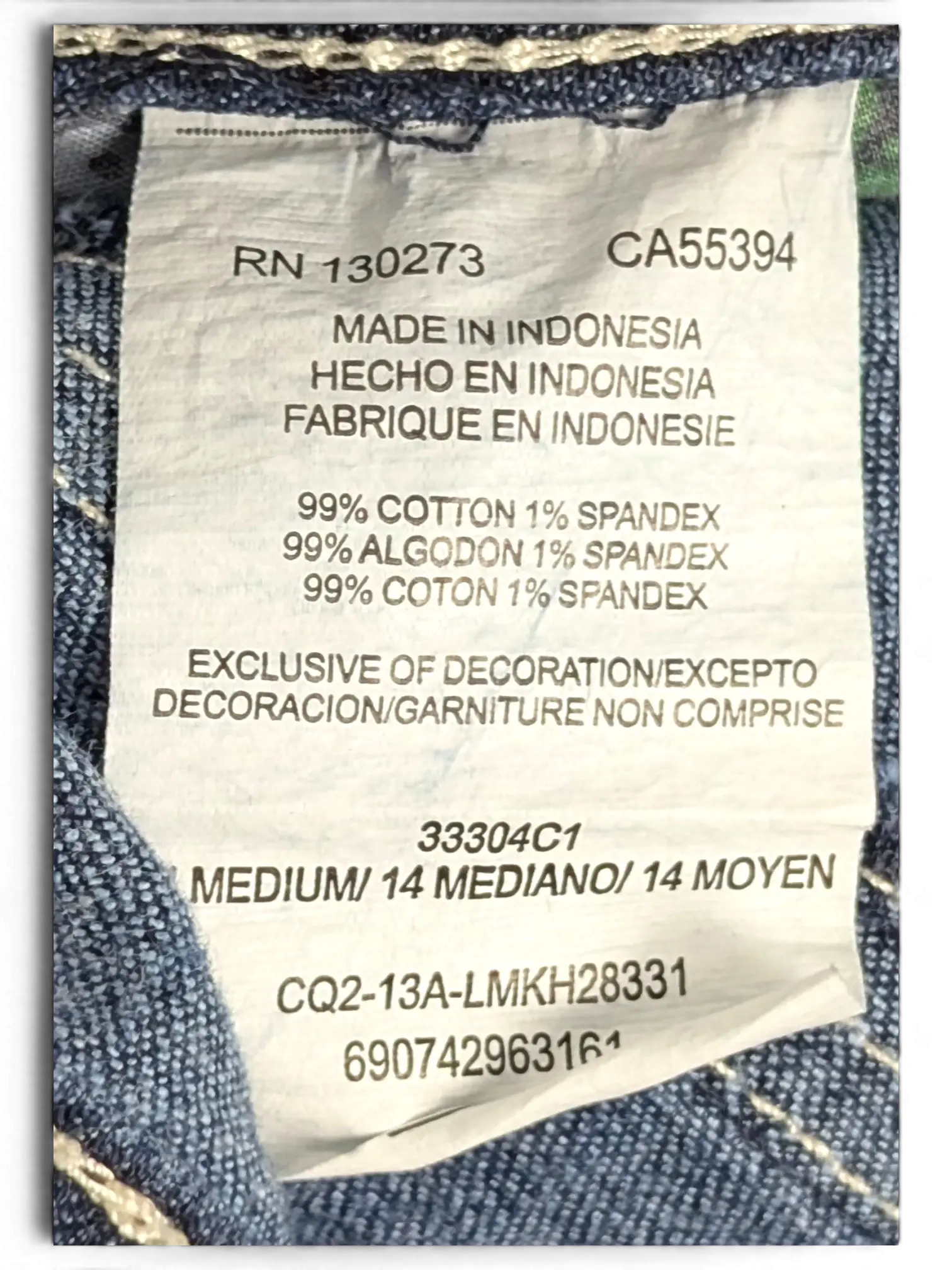 JAKE & IPI Lee Slender Secret size 14 denim jeans care label showing 99 percent cotton and 1 percent spandex blend