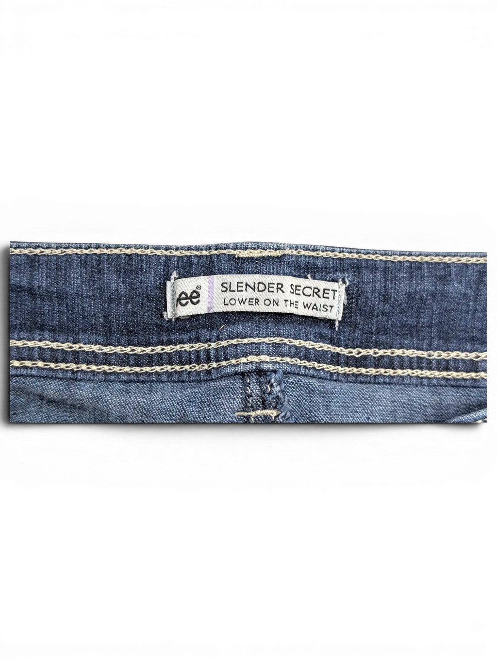 JAKE & IPI Lee Slender Secret jeans back waistband label with contrast stitching on dark blue denim fabric